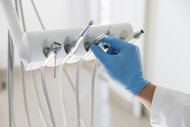 Professional Tooth Extraction technician working in Laurel Hill, NC